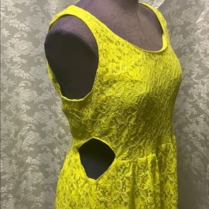 ECKO UNLTD Yellow lace dress with side cut outs.